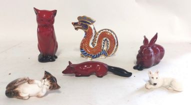 A small collection of ceramics to include 3 items of Royal Doulton Flambe ware , a recumbent hare, a