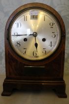 An Edwardian mantel clock with 2 train spring driven movement chiming on a gong contained in an