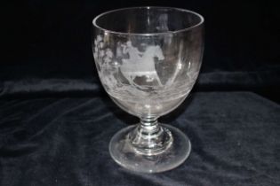 A large glass goblet, 19th century etched with hunting scene, circular pedestal base with stepped