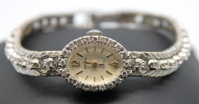 Cara 17 Jewels 18ct White Gold Diamond Wristwatch.  There is Twenty Round Brilliant Cut Diamonds