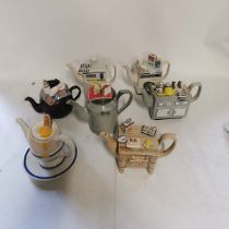 A collection of Novelty Teapots to include; Southwest Ceramics teapots in the form of a kitchen