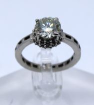 A 925 Sterling Silver Round Brilliant Cut approx. 1.65ct Solitaire Moissanite Halo Design ring.