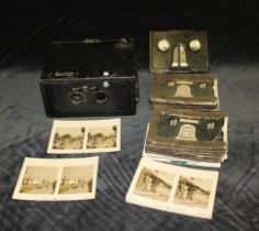 A Thornton Pickard stereo puck box camera and a camerascope with assorted booklets with views of