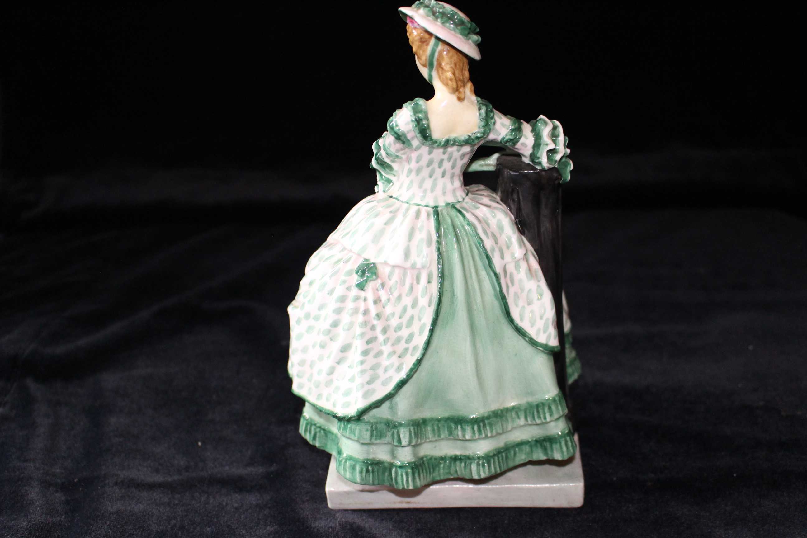 A Royal Doulton figure "Kate Hardcastle" HN 1704, 20cm high condition: Two hairline cracks to base