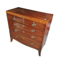 A George III flat fronted 2 over 3 mahogany chest of drawers with bone shield escutcheons, pressed