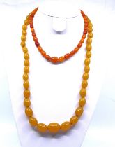 Graduated Butterscotch Amber Bead Necklace and a Copal Resin Necklace.  The Graduated Butterscotch