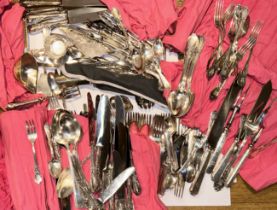 A large collection of silver plated flatware and others