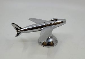 A Dunhill novelty chrome plated table cigarette lighter modelled as an aeroplane, Reg. Design No.