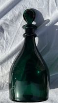 An 18th century decanter, green glass no damages good order 24cm high