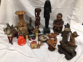 A large collection of carved wooden figures and others (some a/f)