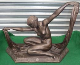 An Art Deco bronze figure of a lady, signed and dated, H:40cm W: 48cm (base)