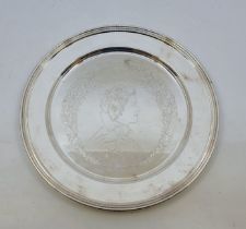 A limited edition silver plate to commemorate Her Majesty Queen Elizabeth II silver jubilee, by