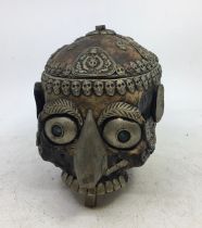 A Tibetan Kapala skull cup. H:18cm (a/f)