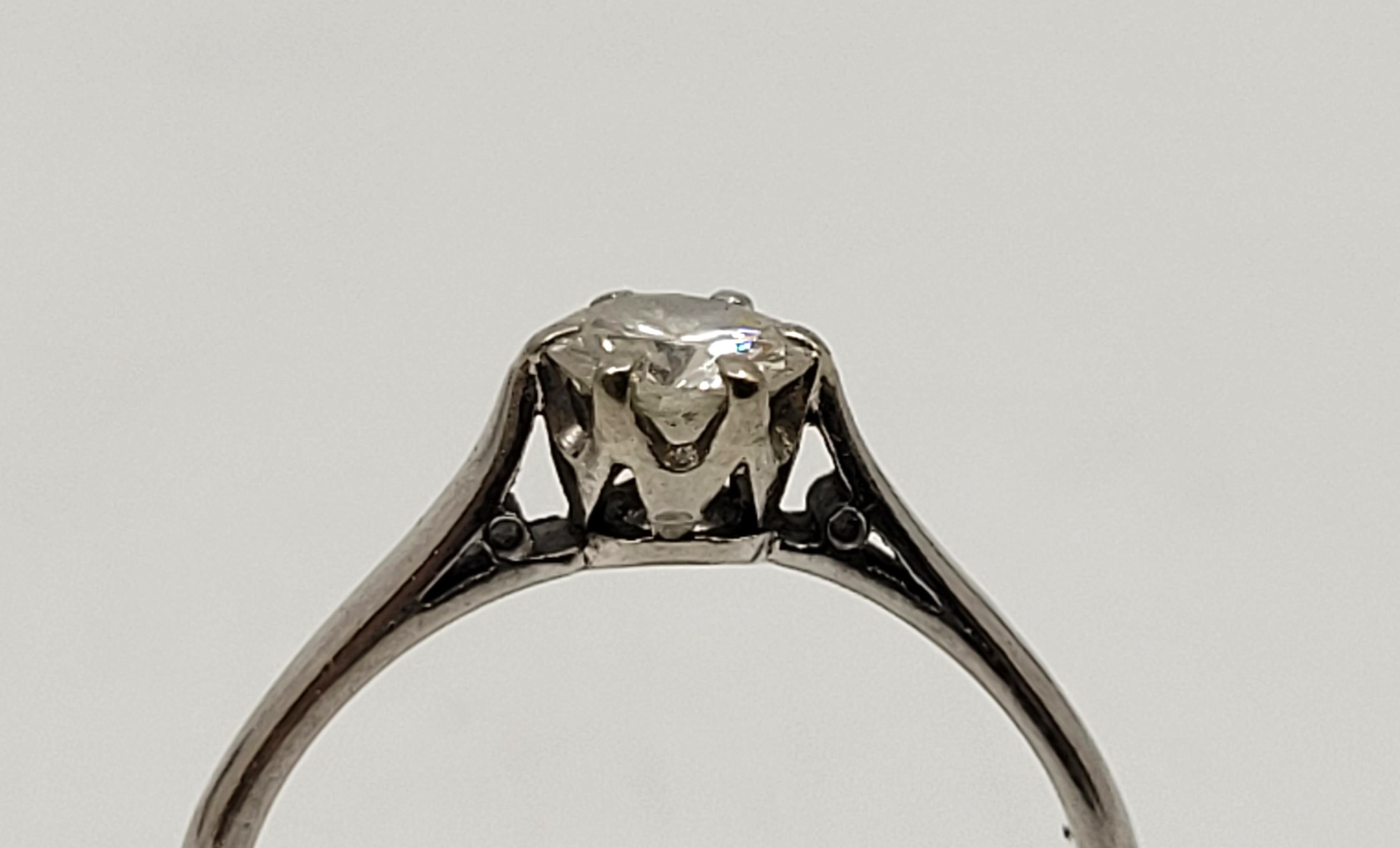 A platinum diamond solitaire ring, claw set round brilliant cut diamond (EDW 0.40 carats), size UK - Image 3 of 3