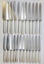 A set of twelve silver handled dessert knives and eleven silver handled table knives, by A