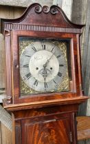 An 19th.century longcase clock with highly figured mahogany case