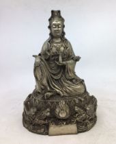 A Chinese bronze figure of a deity. H:25.5cm