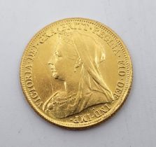 A Victoria "Veiled bust" 1895 gold sovereign coin, London mint.