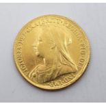 A Victoria "Veiled bust" 1895 gold sovereign coin, London mint.