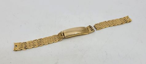 A precious yellow metal watch bracelet, (as found, yellow metal assessed as 18ct. gold). (26.1g)