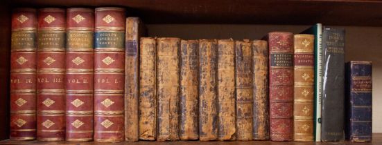 A miscellaneous collection of leather-bound books to include The Works of Shakespeare, seven