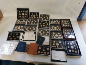 A collection of United Kingdom proof set coins dated 1982,84,86,87,88,89,96,97,98,98,99,2000,01,02,