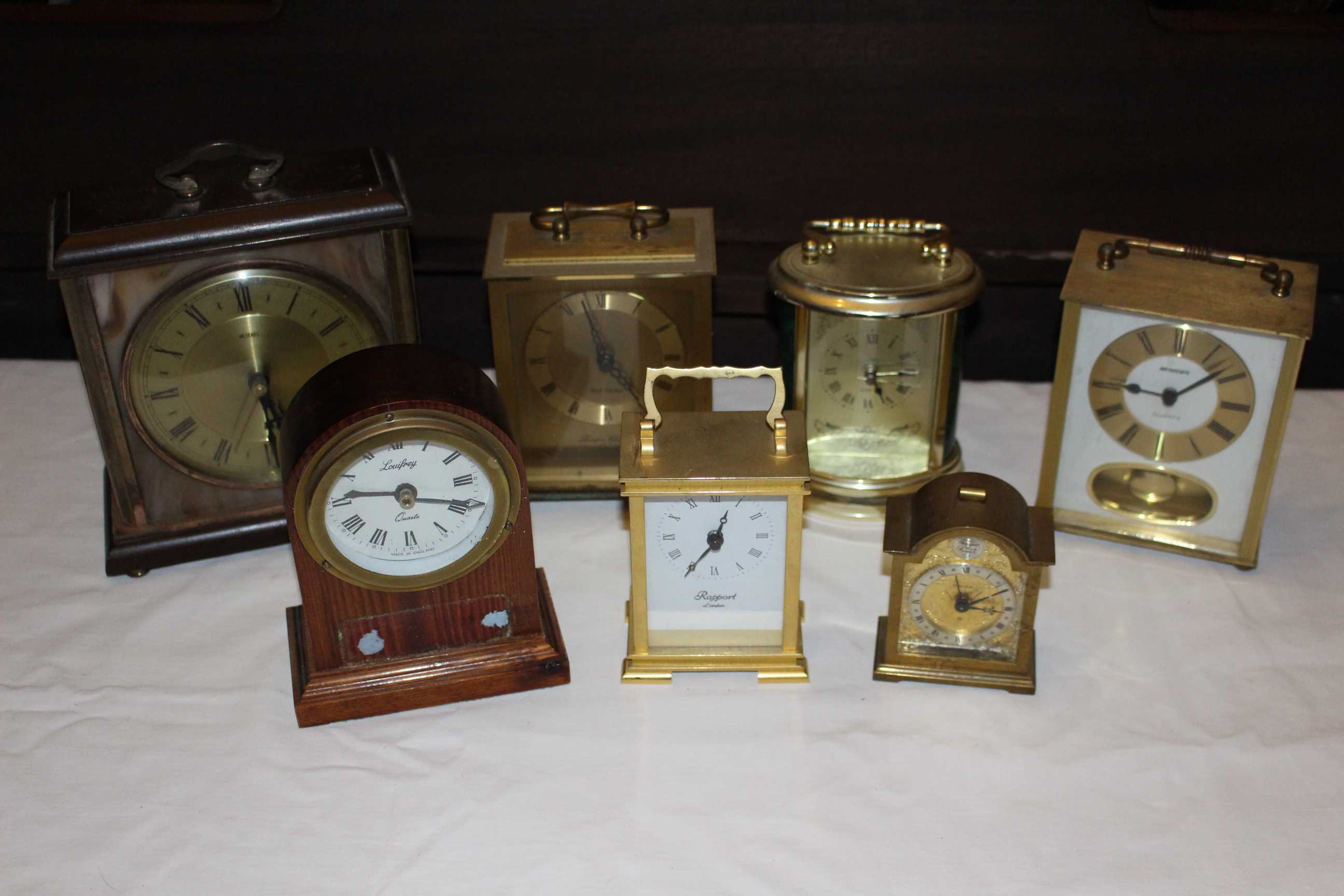 Collection of 7 x Carriage/mantel clocks mixture of brass wood plastic, battery and or mechanical