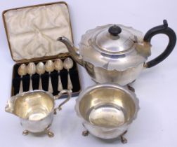 A Silver Plated Tea Set comprising of a Teapot with ebonized handle & finial, Milk Jug and Sugar