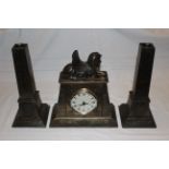 Modern heavy resin Egyption styled mantel clock with 2 x candle stick garnitures, movement is