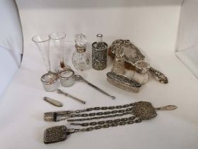 A quantity of silver mounted items to include; bottles, salts, vases, pin dish and a silver backed