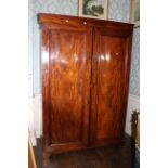 A Victorian flamed mahogany twin wardrobe. 199cm H x 136cm W x 56cm D