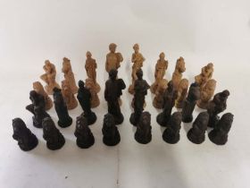 Heavy weighted plain theme chess pieces in crushed marble and resin complete with felted underlay