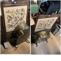 An oak embroidered panel fire screen and large oval Brass trough on claw feet.