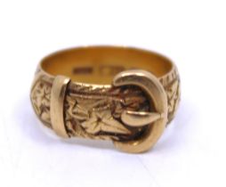 18ct Yellow Gold Buckle ring.  There is a leaf pattern on the ring with a buckle design.  The ring