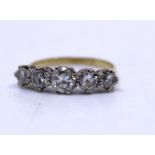 18ct Yellow Gold Five Stone Old European Cut Diamond ring. The centre Old European Cut Diamond
