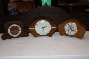 3 x Mid century wooden cased mechanical/wind up mantel clocks all with chime facility but selling as