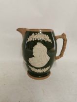 A large Queen Victoria Diamond Jubilee Jug with tree branch handle by Copeland, retailed by T