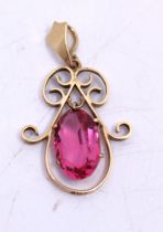 Art Nouveau in style 9ct Yellow Gold Oval Brilliant Cut Pink Tourmaline Pendant.  The Oval Brilliant