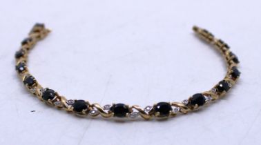 Ladies 9ct Yellow Gold Sapphire & Diamond Bracelet. (Link is snapped near the fastening.) The