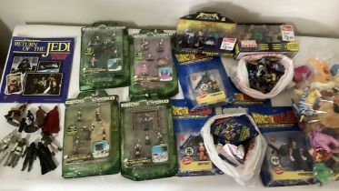 A collection of late 80s/90s/00s toys and collectibles to include figures from Digimon, Pokemon,