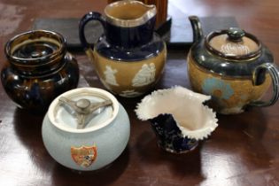 A Doulton Lambeth vase, white metal rimmed jug, and teapot. Together with 2 tobacco jars. (1)