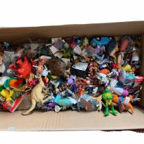 A large selection of 80s-00s toys to include Robin Hood figures, jungle animal figures, a Dancing