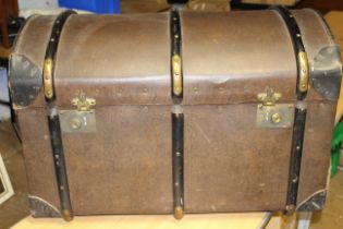 Early 20th century leather style bound dome topped trunk. (1)