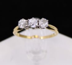 18ct Yellow Gold Three stone Old European cut Diamond ring.  The centre diamond is approx 0.25ct and