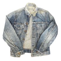 A collection of vintage clothing to include a vintage, distressed Levi's jacket with the big 'E'