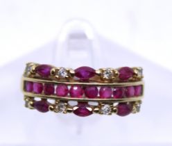 9ct Yellow Gold Ruby & Diamond Dress ring.  The ring is hallmarked '375' for 9ct Gold.  The ring has