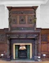 A large quantity of 17th century style oak panelling carved with linenfold and foliate panels, the