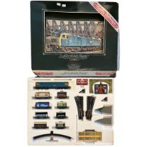 A collection of vintage childhood toys to include: an electric Hornby Silver Jubilee train set (