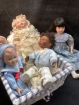 Vintage Modern Porcelain Artistdolls to include a Pauline Asian faced child in a liberty print