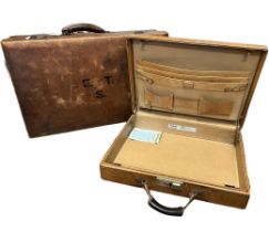 A Hartman luggage briefcase in light brown leather with brass tone hardware and pale caramel leather